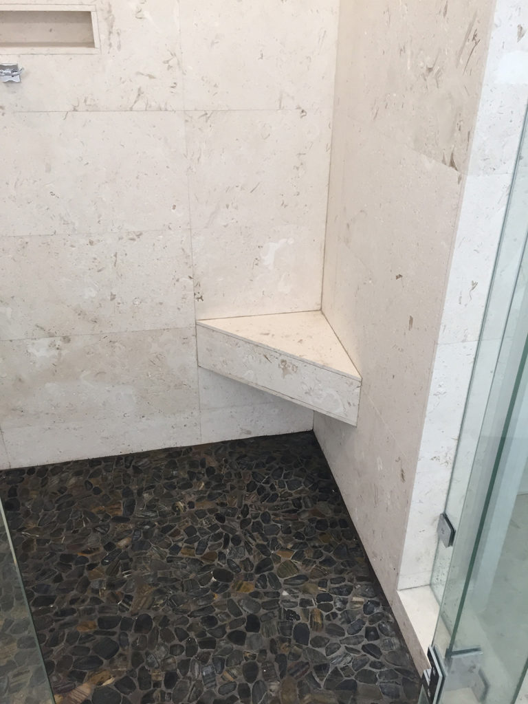 Travertine wall tile in shower