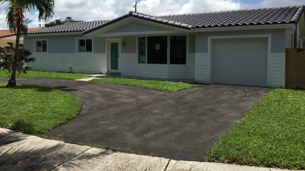 After photo of exterior remodel with stucco siding