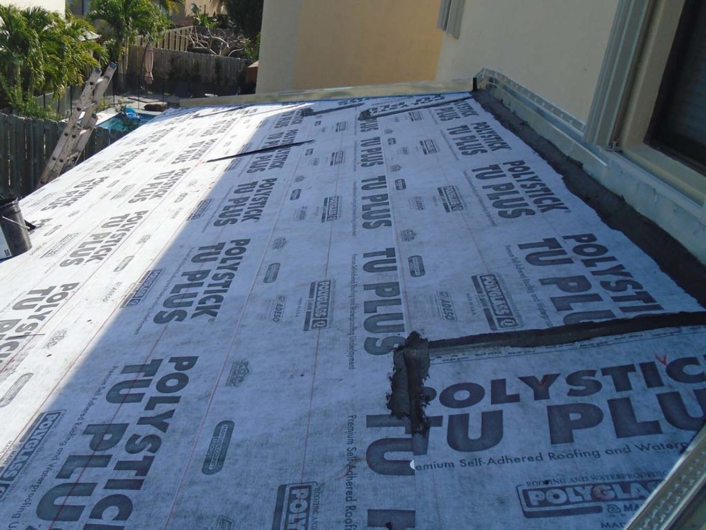 New pitched roof over covered patio