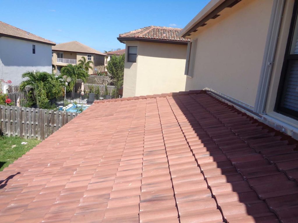 New pitched roof over covered patio