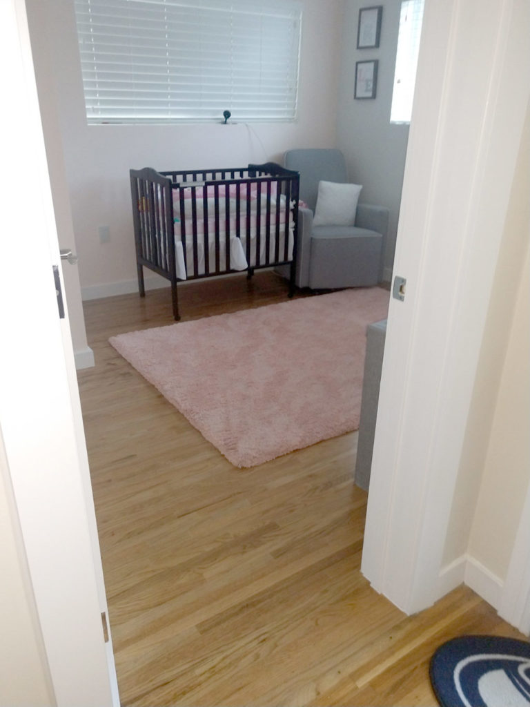 Interior wood floors to match existing at transition from foyer to new room