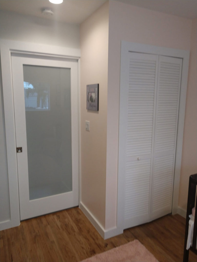 Finished garage conversion with new closet & bathroom