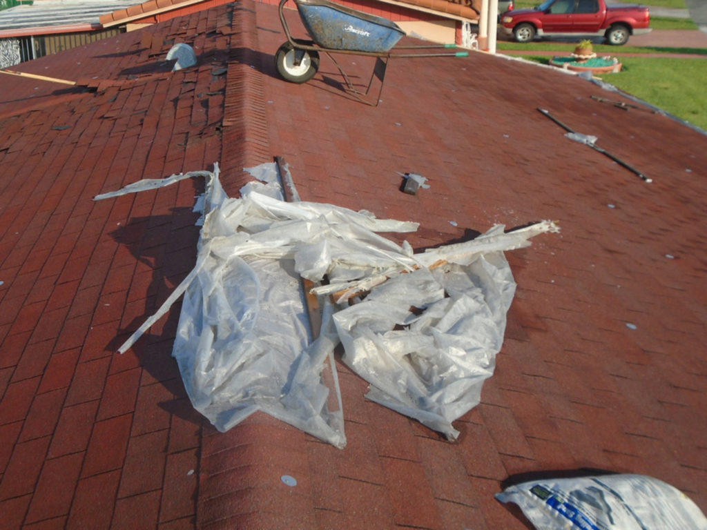 Before photo of old shingle roof