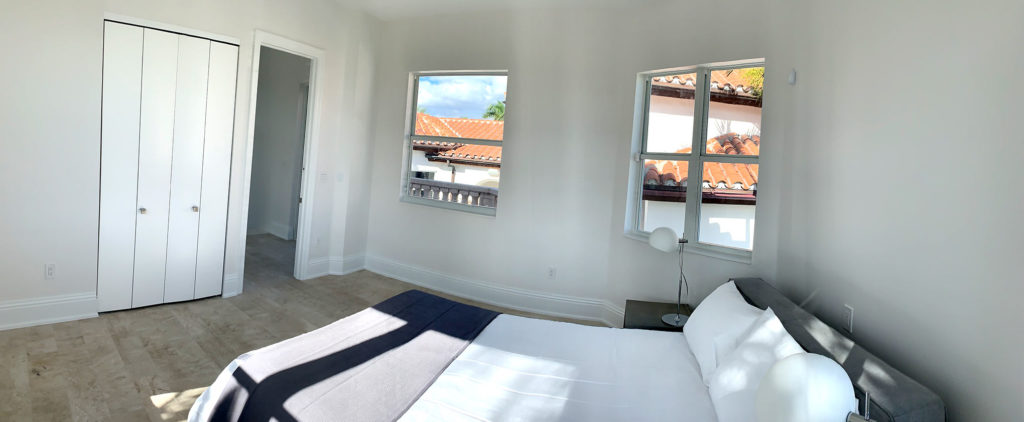 Renovated bedroom with new porcelain floors