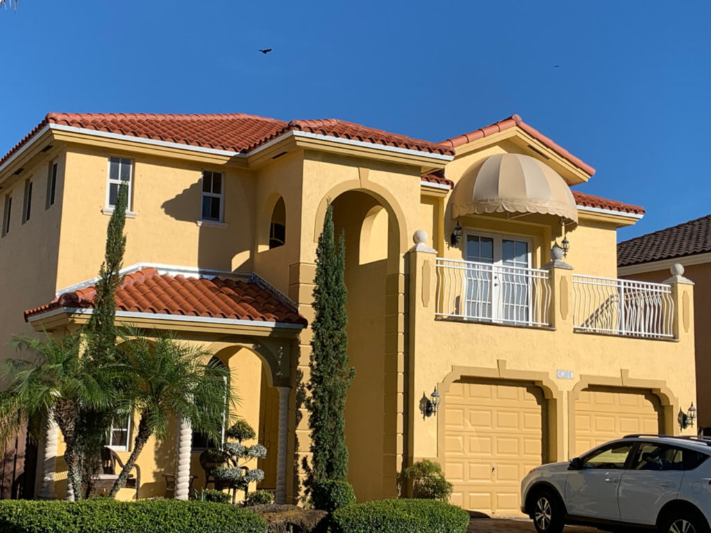 After photo of new clay tile roof installed.