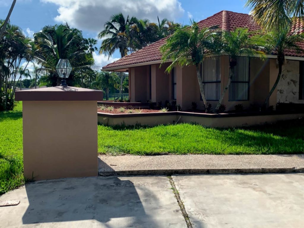 After photo of repaired driveway column