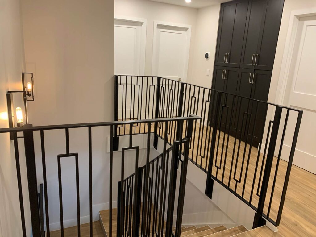 2nd floor landing with shaker linen cabinets