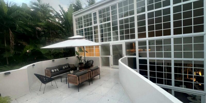 View from rooftop patio towards existing home