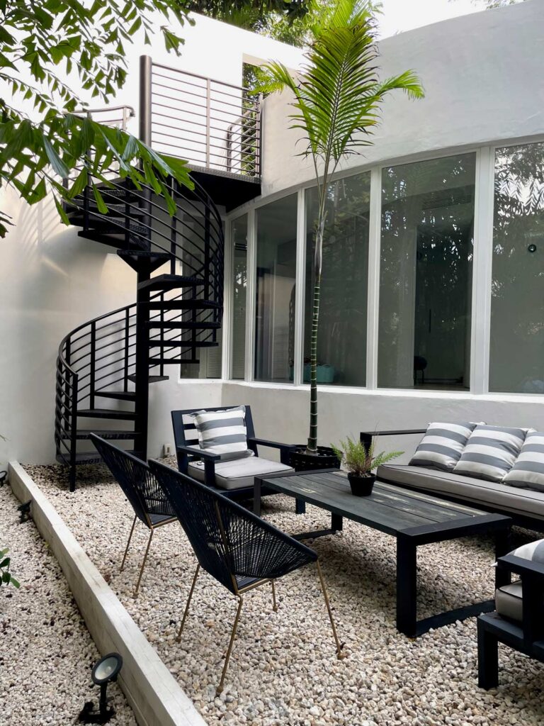 West side staircase leading to rooftop patio